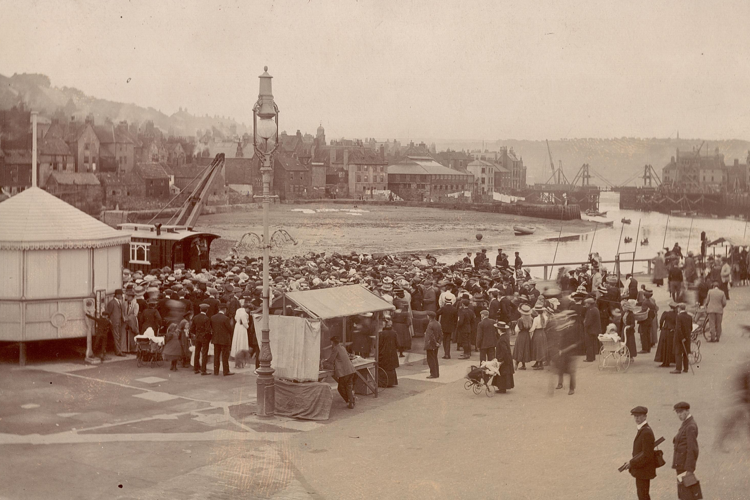 NUWSS gathering in 1908, a speech being made from a caravan by a harbour