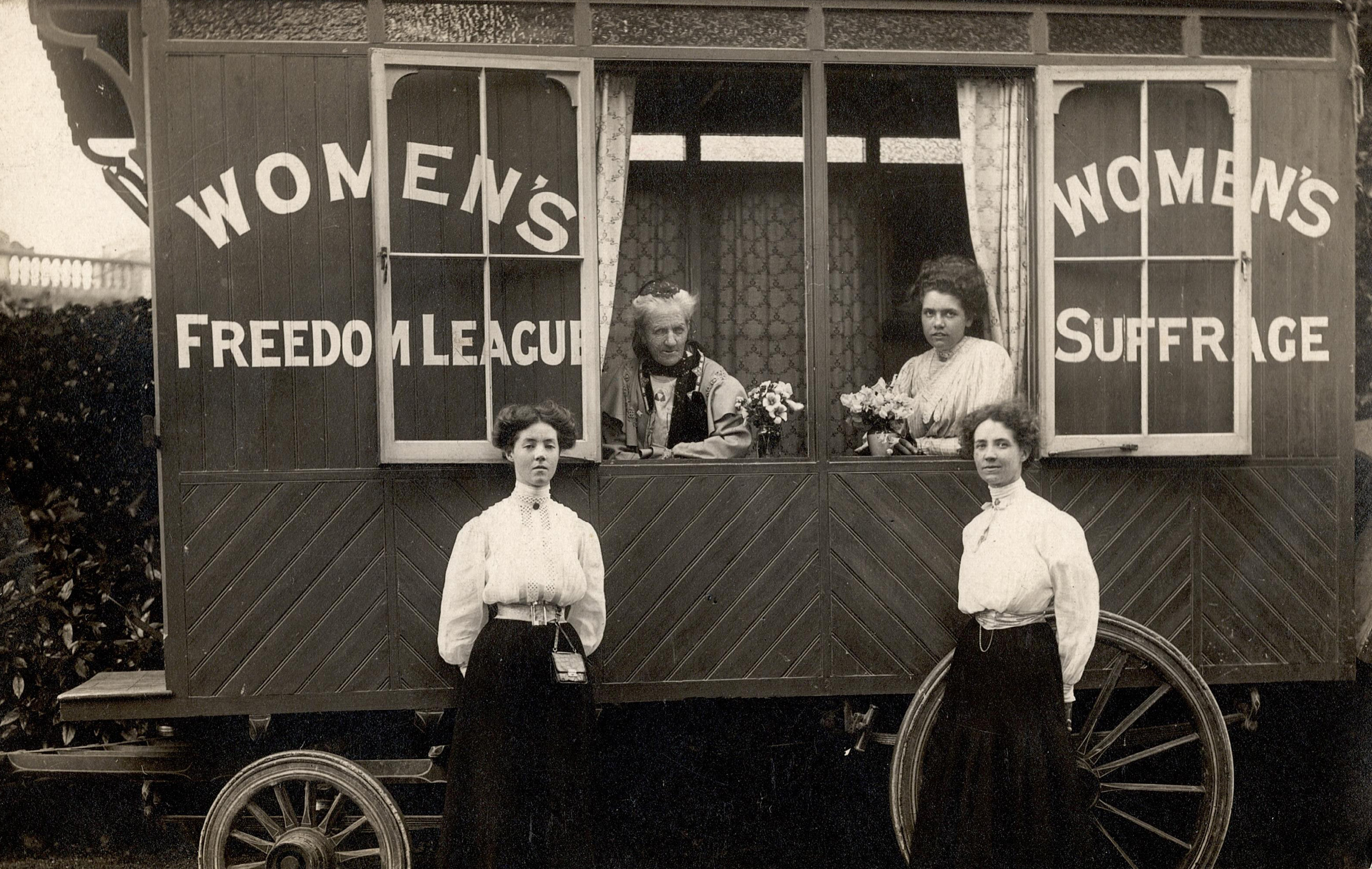 Founder of the WFL Charlotte Despard and three other women by a caravan